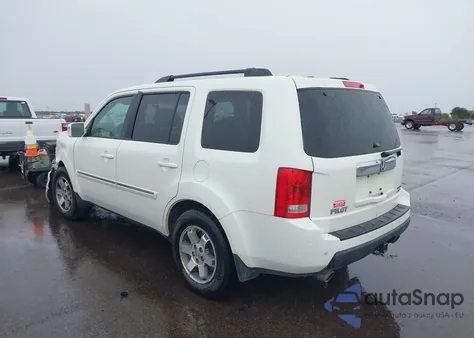 2011 Honda Pilot Touring z USA, uszkodzony, nr VIN 5FNYF4H91BB085186